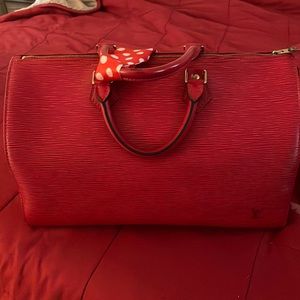 A LV red large epi in good condition